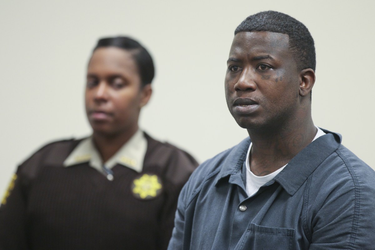 Mar. 27, 2013 Atlanta: Fulton County Sheriff deputy T. Reynolds (left) looks on as defendant Radric Davis (right) listens. Rapper Gucci Mane was denied bond Wednesday at his first court appearance after his arrest for allegedly assaulting a soldier earlier this month at an Atlanta nightclub. His next court date is April 10. The musician, whose real name is Radric Davis, was booked into the Fulton County Jail Tuesday, charged with aggravated assault with a weapon, according to online jail records. Fulton County sheriff’s spokeswoman Tracy Flanagan said Davis turned himself in at the jail about 11:30 p.m. Tuesday, and will face a magistrate for a first appearance at 11 a.m. Wednesday. Channel 2 Action News reported last week that Atlanta police had issued a warrant for the rapper following the March 16 incident at the Harlem Nights club on Courtland Street. The alleged victim told Channel 2 that Davis hit him in the head with a champagne bottle after he asked to take a photo with the rapper. “I’m in the military. I wanted to get a picture with Gucci Mane, is it okay?” the soldier said he asked a security guard. “I was speaking to the security guard, and Gucci Mane hit me in the head with a bottle,” the solder told Channel 2. The soldier told the station that he went to Grady Memorial Hospital by ambulance, and his injury required 10 stitches. JOHN SPINK / <span 
                data-original-string=